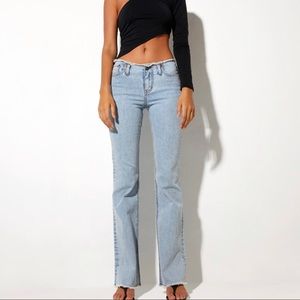 MOTEL X BARBARA KRISTOFFERSON Frayed Low Rise Jeans in Light Blue